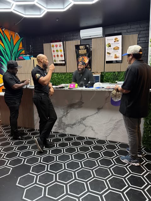 Guests at the Smooth N Groove counter inside the shop